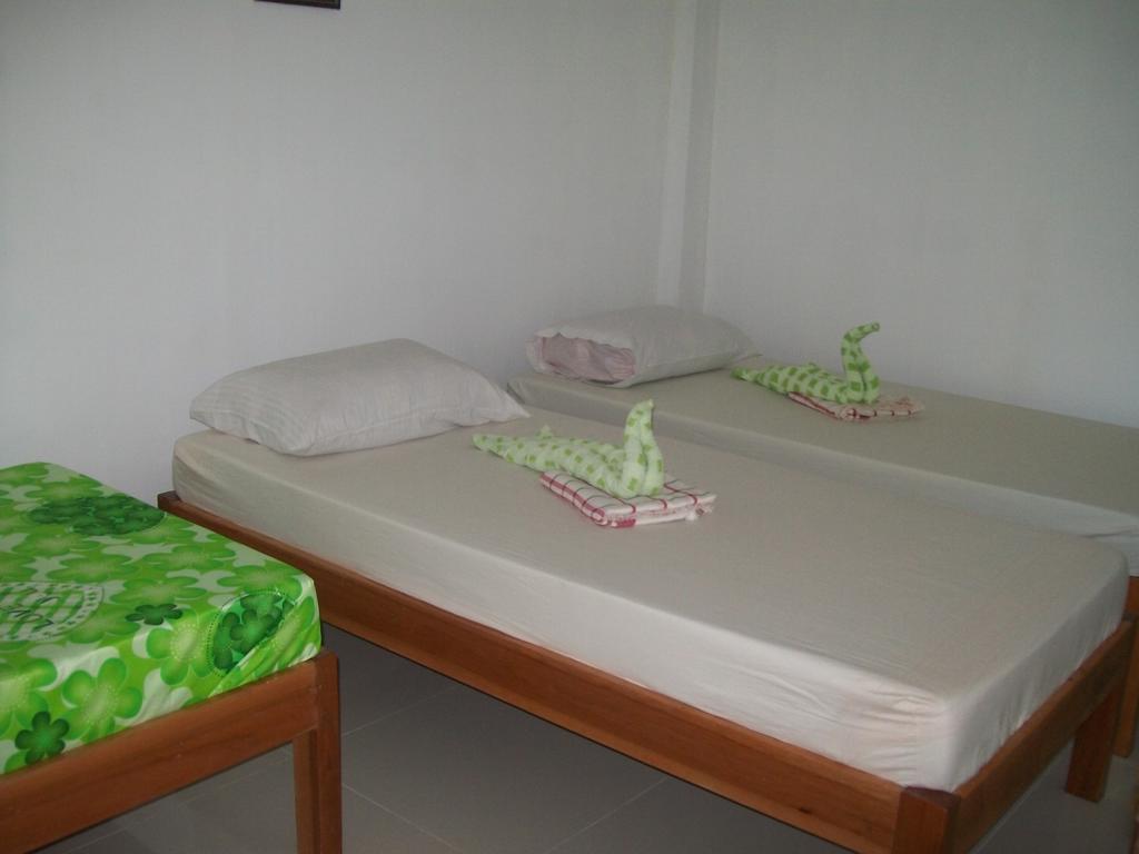 Charm Guest House Пуэрто-Принцеса Номер фото
