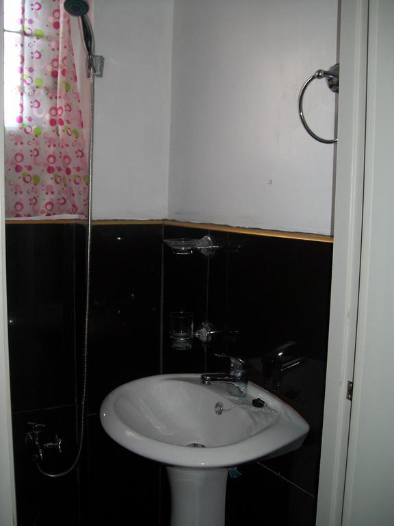 Charm Guest House Пуэрто-Принцеса Номер фото